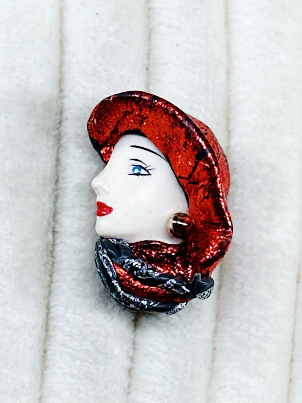 338u. Red Hat Clay Ladyface Brooch